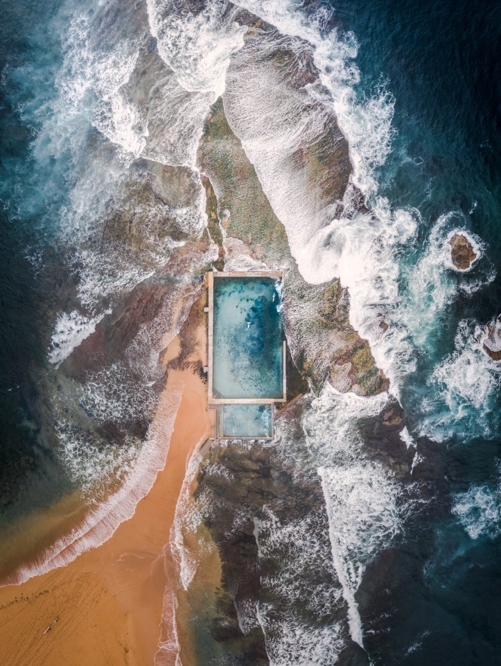 WINNER: 'Tides' was taken in Mona Vale, Sydney, one of the many rock pools on the eastern coast of Australia, with a Mavic Pro II Drone