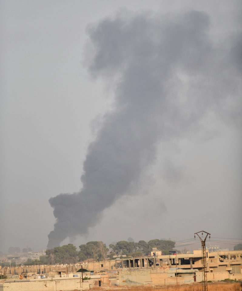  Smoke rises after Turkish airstrikes on the border town of Ras al-Ain