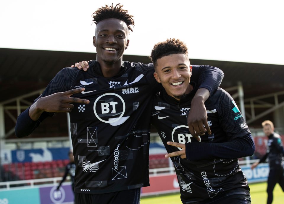  Ez-Man City kid Jadon Sancho, shown in England training with Tammy Abraham, has progressed faster than Phil Foden at international level