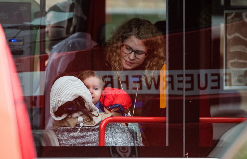 Relieved worshippers were photographed leaving the synagogue after the attack was over