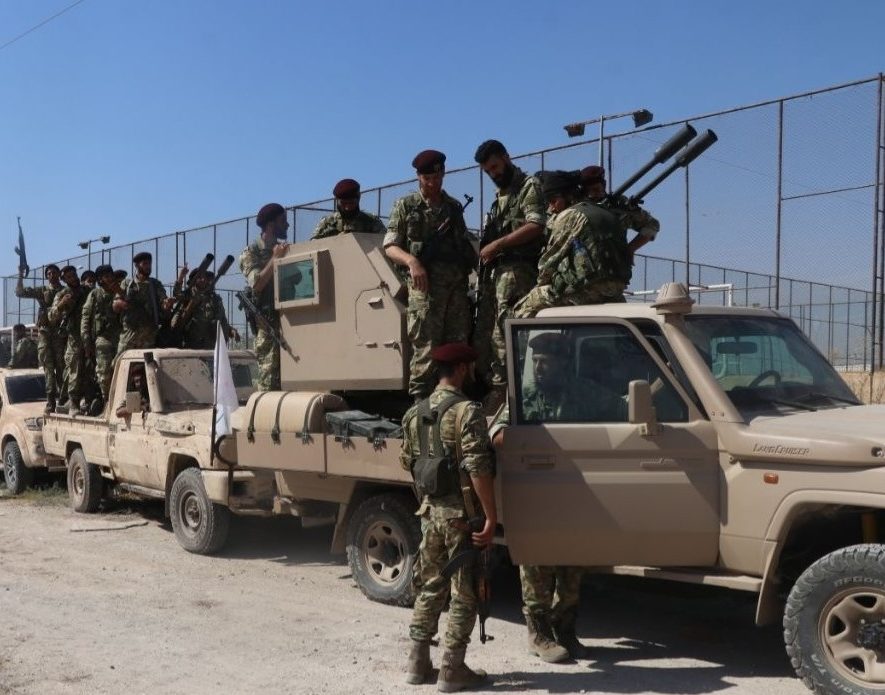  Members of Syrian National Army (SNA) head towards the Battlefront