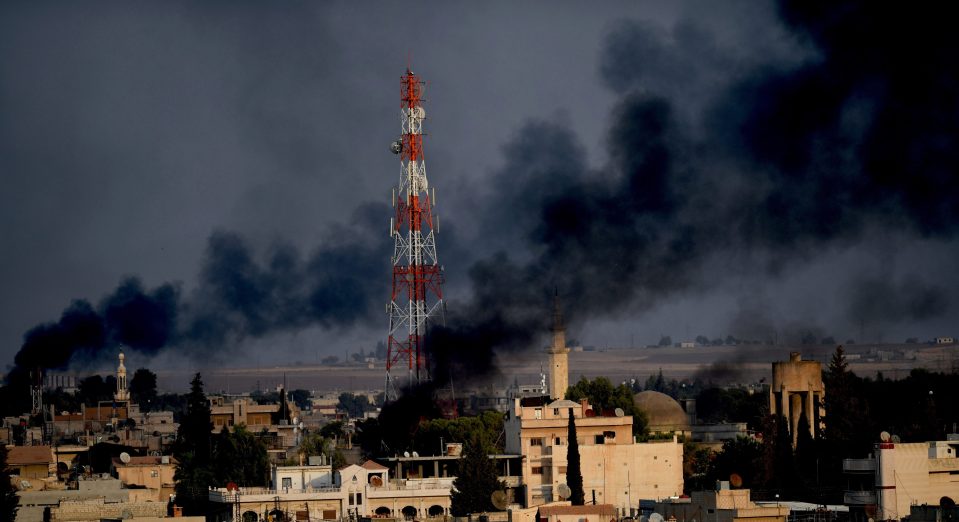  Dark smoke billows in Syria's Rasulayn town after terrorists burn tires to cause black layer of smoke to obscure targets from Turkish aircraft