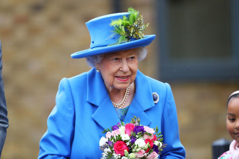  The monarch wore a cornflower blue dress and coat from designer Angela Kelly, alongside a matching hat