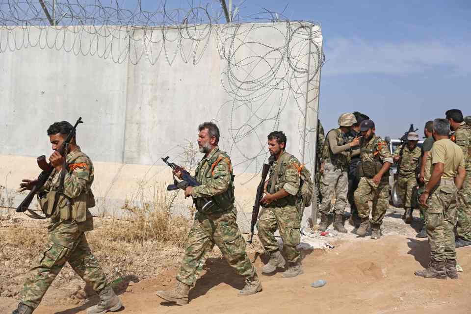  Pro-Turkish Syrian fighters cross the border into Syria