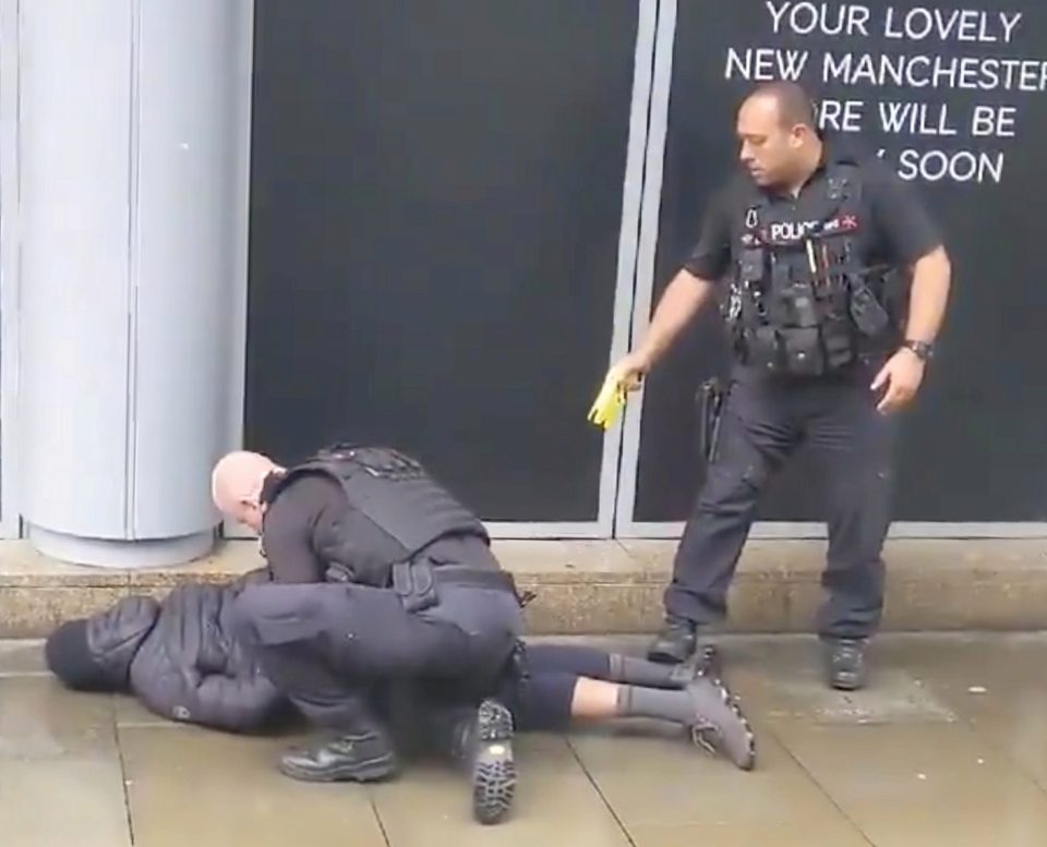  Within five minutes armed cops detained the alleged attacker in Market Street outside the centre