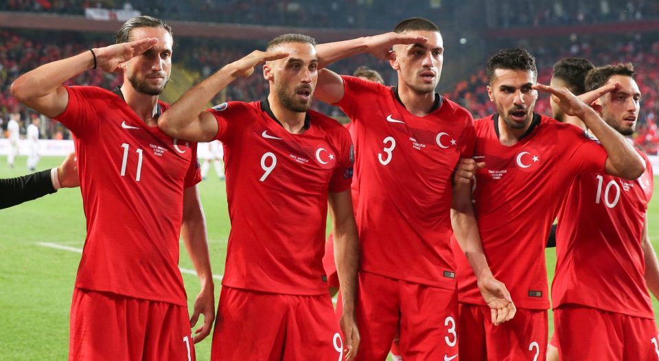  And here is the original controversy - as scorer Cenk Tosun and his Turkey team-mates hail his winner against Albania