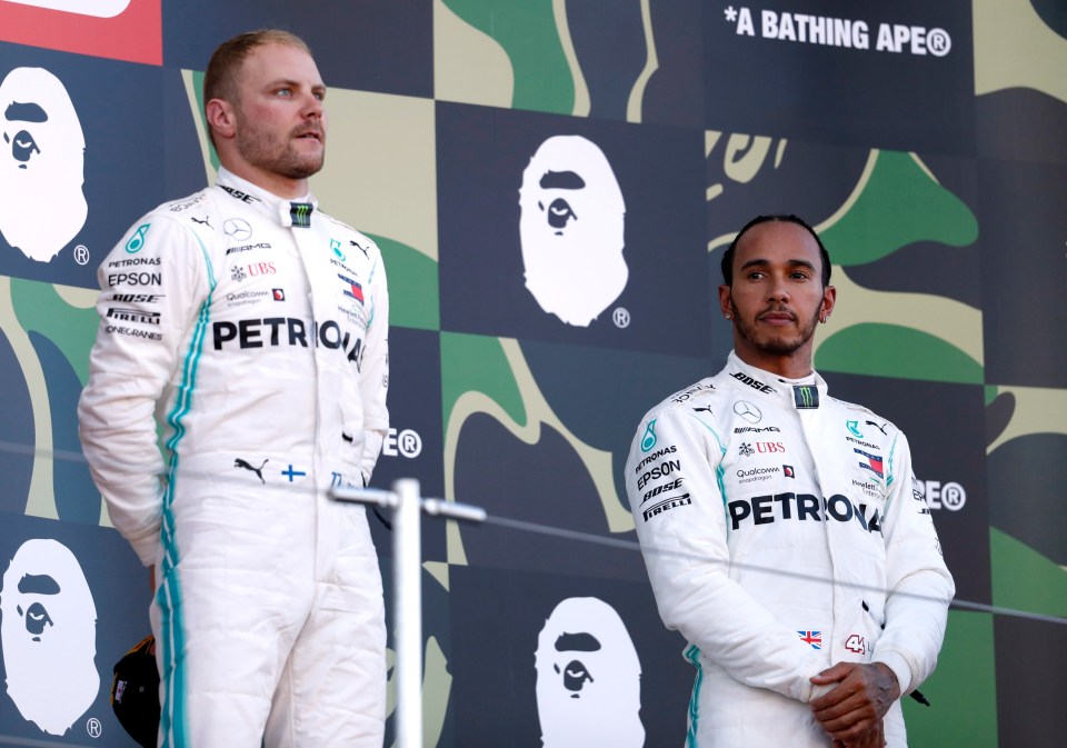  Lewis Hamilton saw his team-mate take the win that sealed Mercedes' title