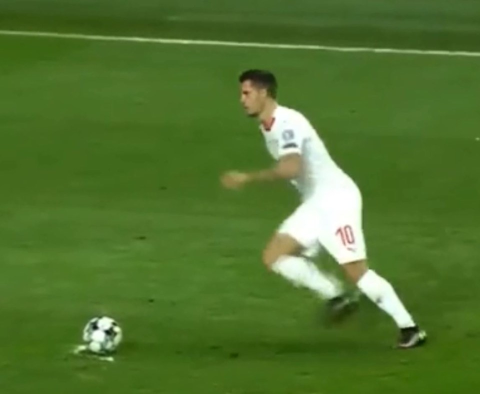 Swiss international Granit Xhaka runs up to take the free-kick