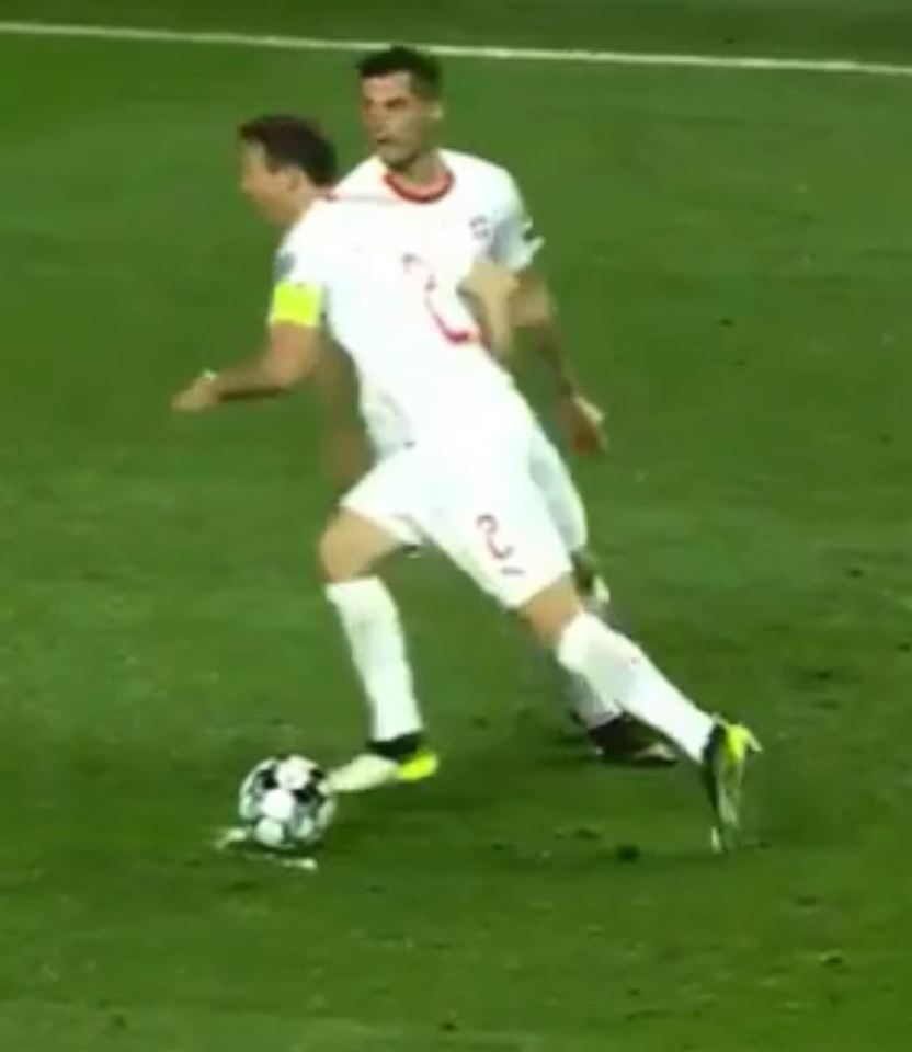  Stephan Lichtsteiner then makes his run and steps over the ball