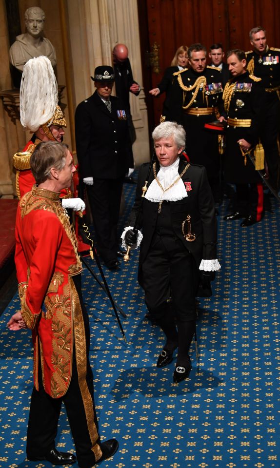  Lady Usher of the Black Rod Sarah Clarke (centre) arriving for the State Opening of Parliament