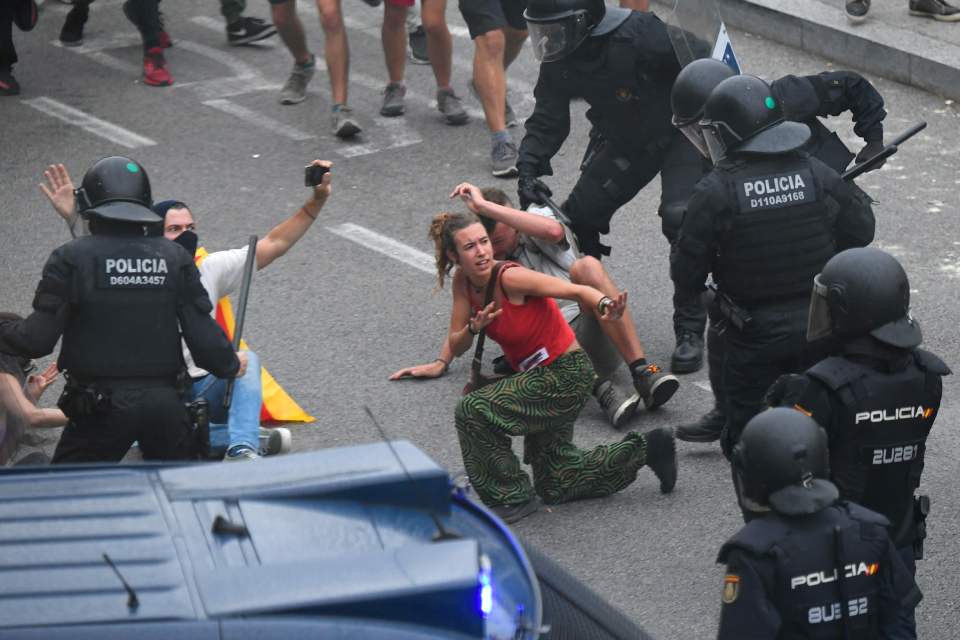  Riot police move in to clear protesters from part of the airport