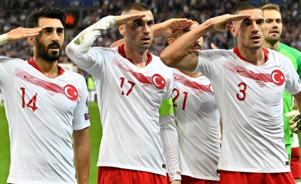 Turkey players make their controversial military salute after Kaan Ayhan bagged a late equaliser during the 1-1 draw in France