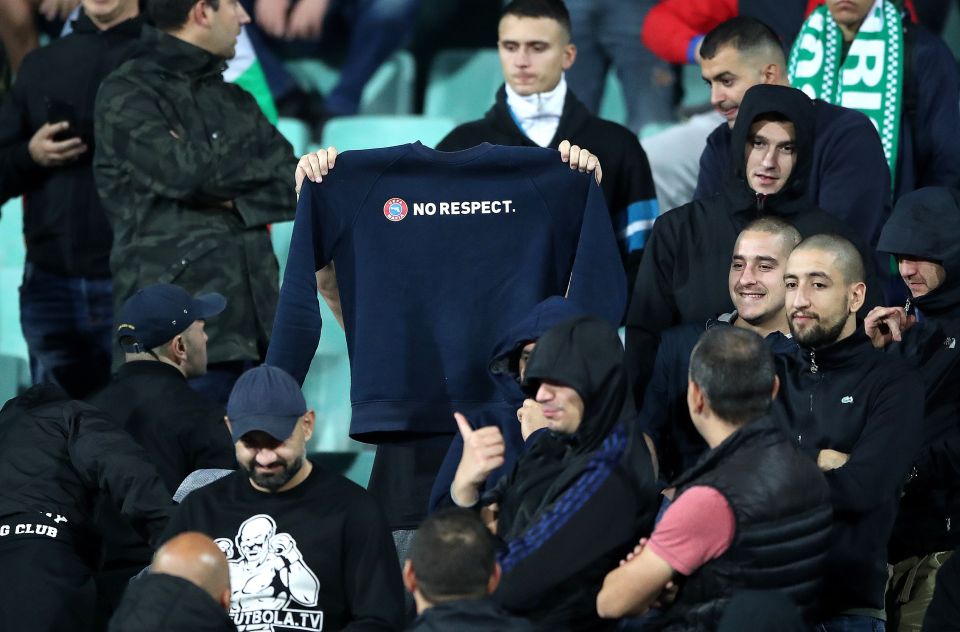  One supporter held up a jumper which read 'No Respect' making a mockery of Uefa's anti-racism campaign