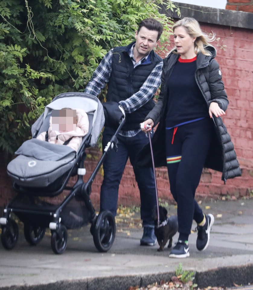  Little Isla was wrapped up in a trendy pink puffa and transported in a chic Bugaboo buggy