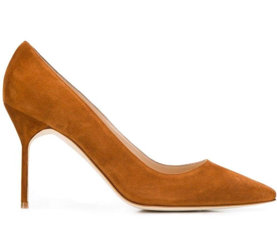  The Duchess completed her look with a pair of £562 Manolo Blahnik heels