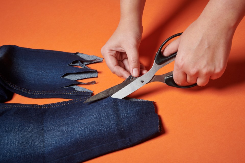  Jagged edges at the bottom of a pair of jeans creates the perfect zombie effect