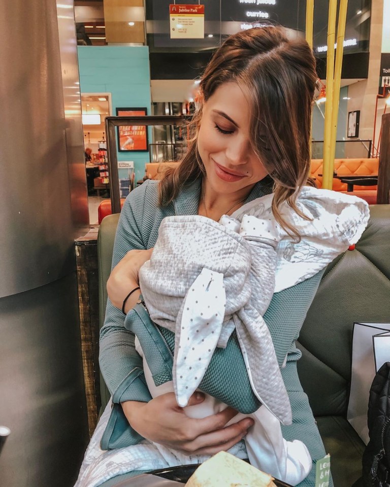 Chloe Lewis shared this sweet snap of her holding her newborn