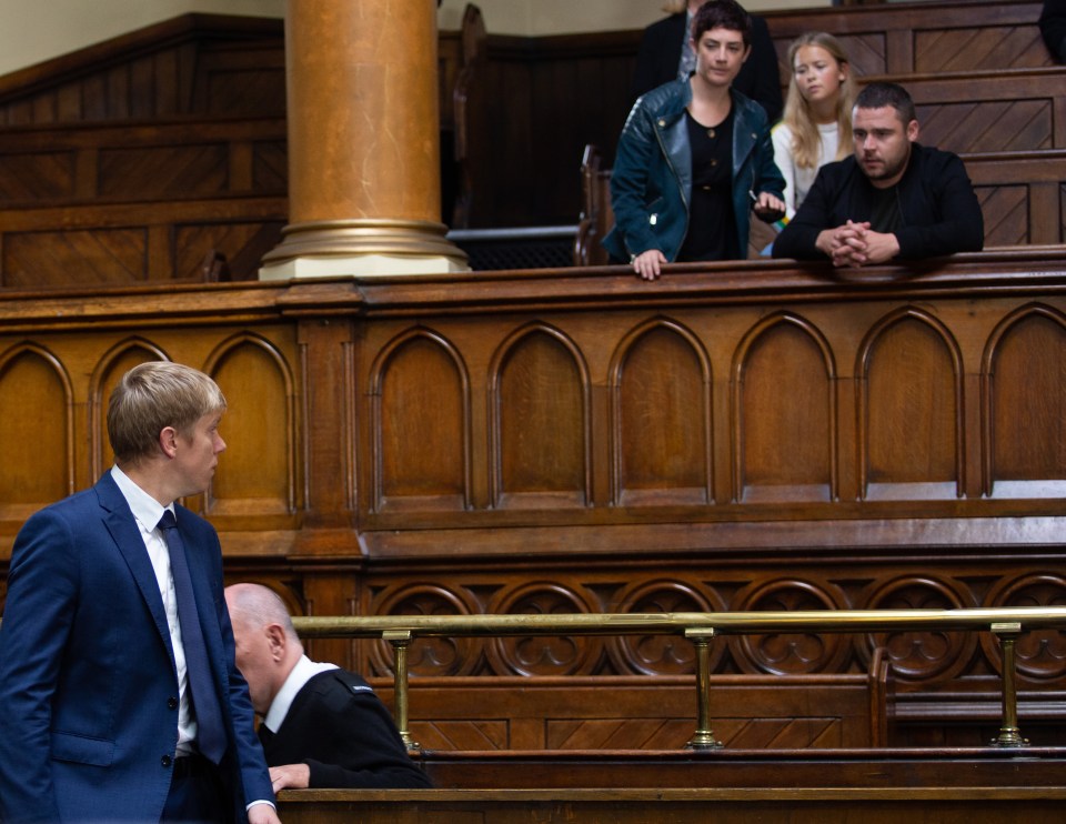  A distraught Aaron watches on from the gallery as Robert awaits his verdict