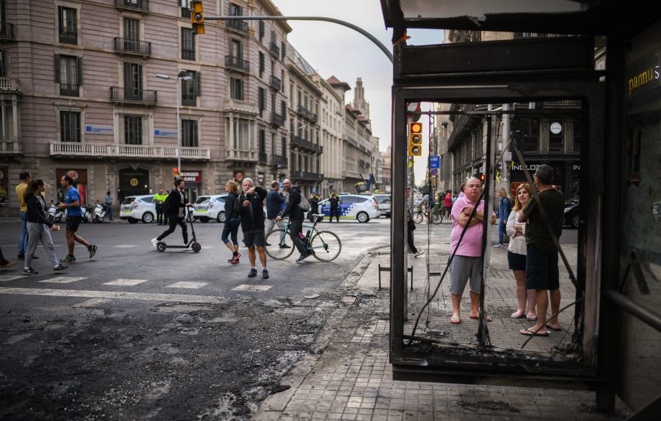  Street damage following a night of rioting in Barcelona