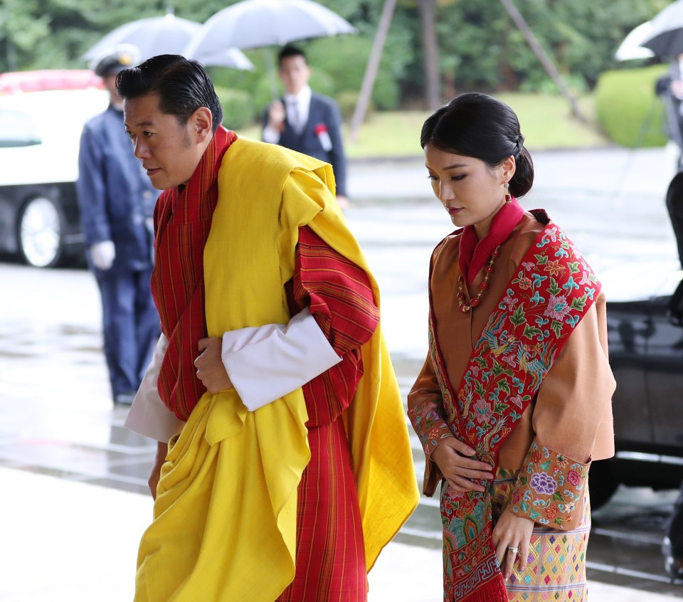  Druk Gyalpo - or 'Dragon King' - of Bhutan and his wife, Jetsun Pema at the Imperial Palace