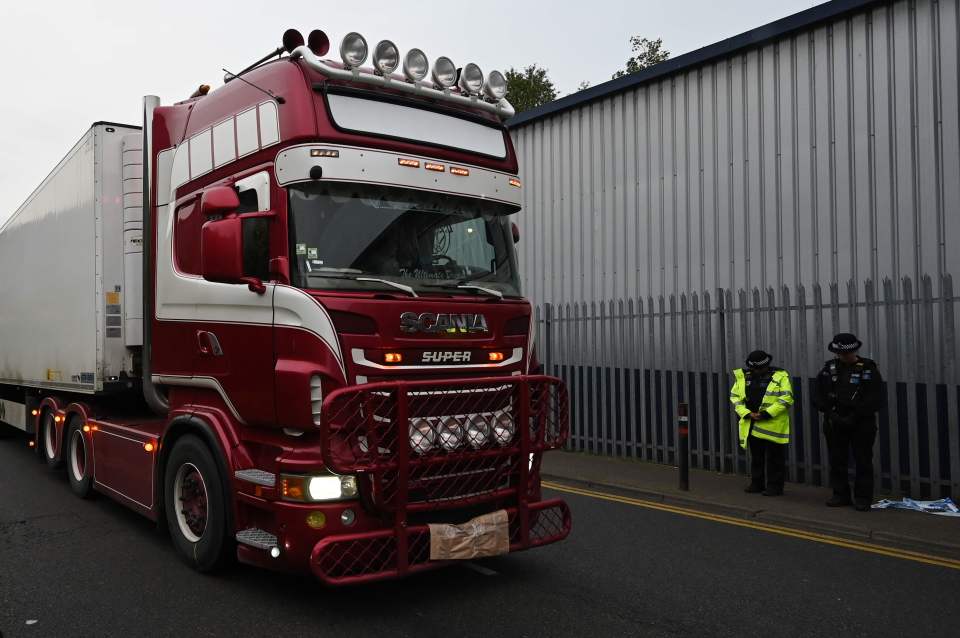  Cops were seen bowing their heads as the truck drove past