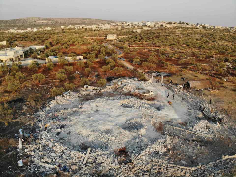  Rubble above the site of the tunnel where the ISIS leader is believed to have blown himself up