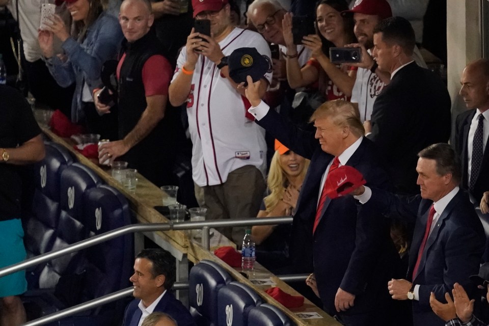  Trump continued to wave to the crowd despite the torrent of abuse