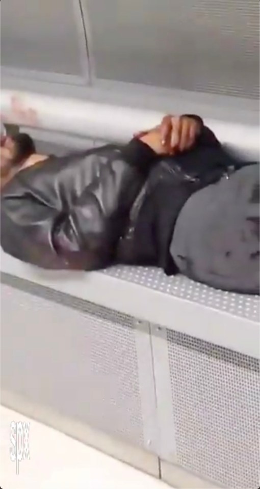  Another man is seen lying with blood dripping from horrific wounds