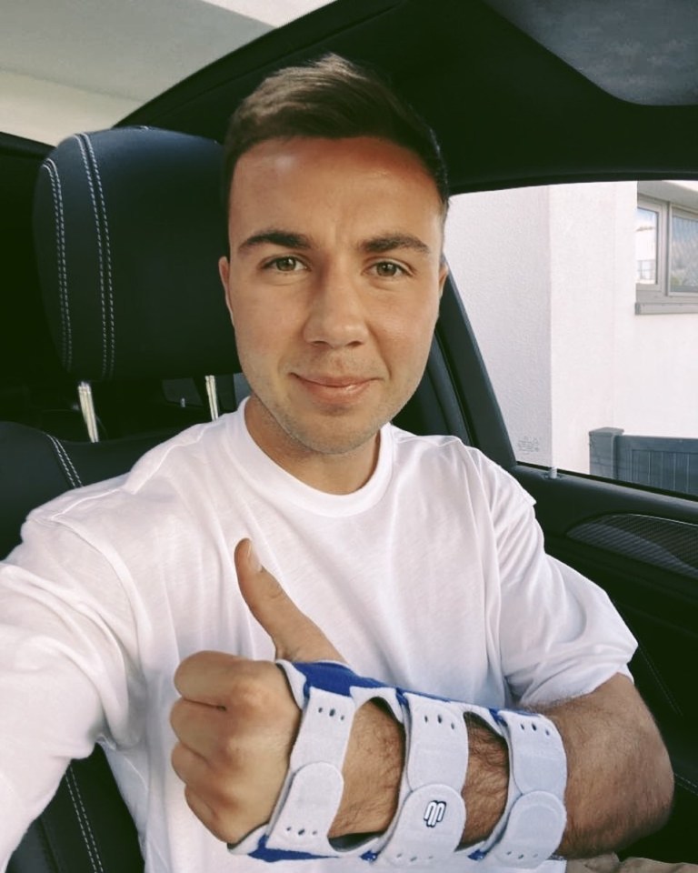  Mario Gotze is wearing a cast on his arm - but is still ready to play in Dortmund's cup game