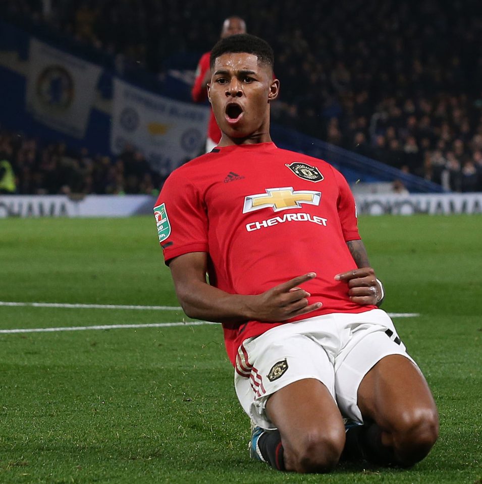  Man Utd striker Marcus Rashford slides into celebrate the looping deadball that saw off Chelsea in the Carabao Cup last 16