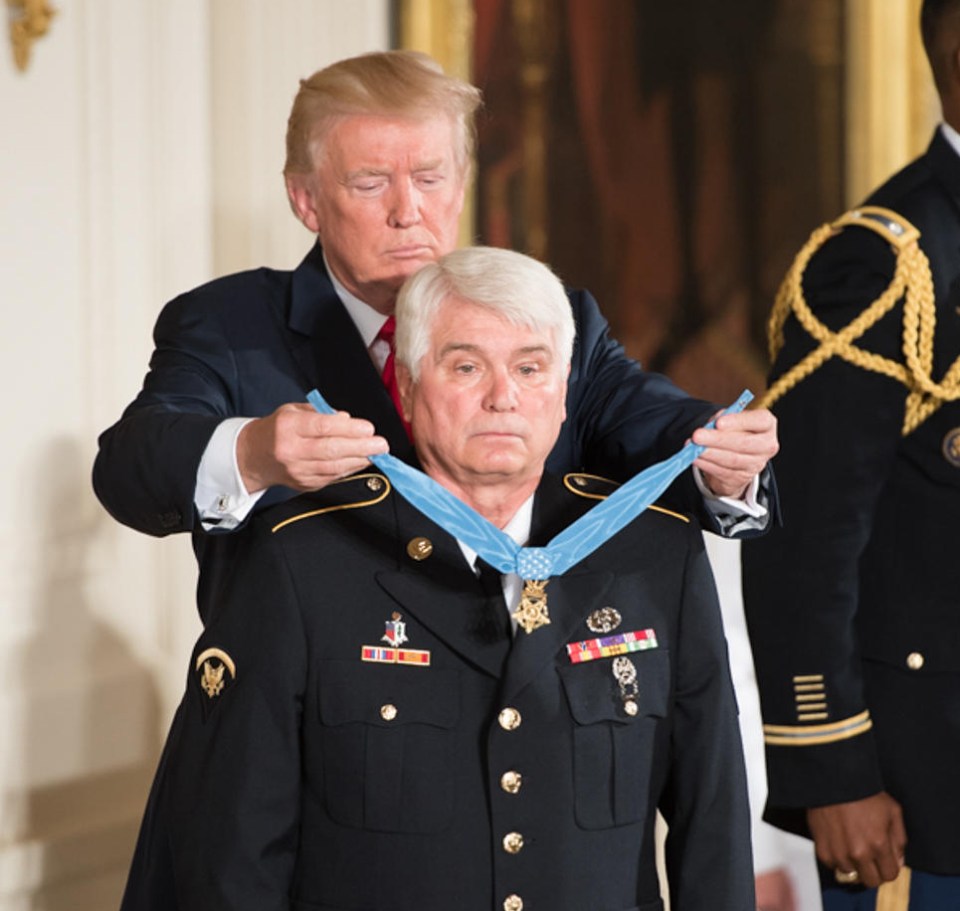 The Associated Press photo of an actual medal presentation by Trump – snapped in 2017 – shows hero medic James McCloughan