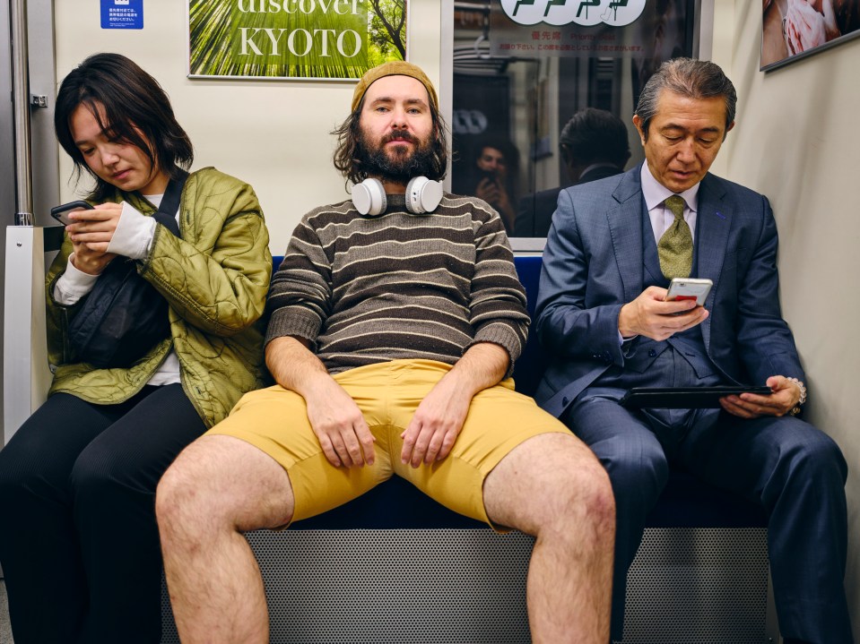  Manspreading, sometimes referred to ballrooming or mansitting, is a term that describes how some men sit on public transport with their legs spread wide apart