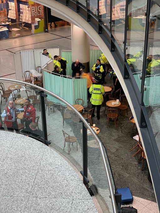  Cops and medics in Starbucks in the packed Arndale Centre following the attack