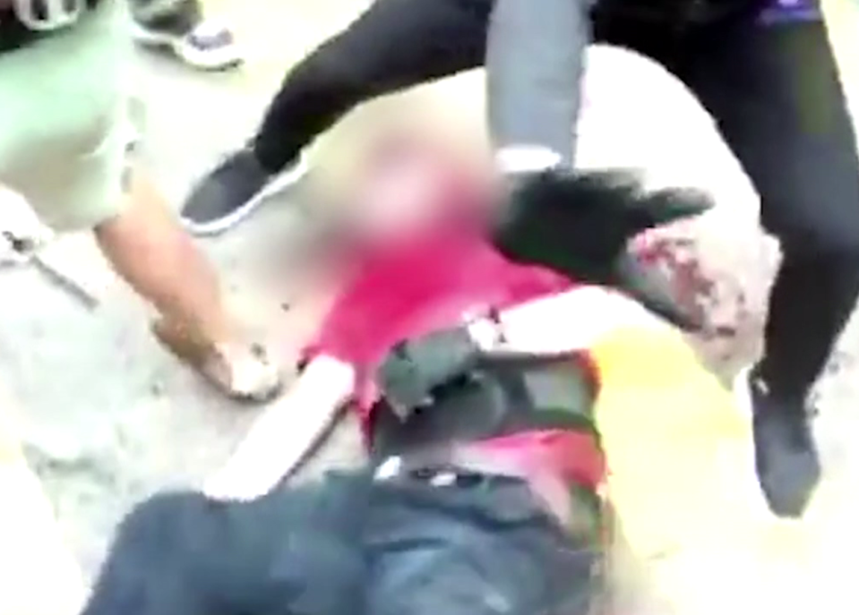  A cabbie is battered by a furious mob in shocking mobile phone footage