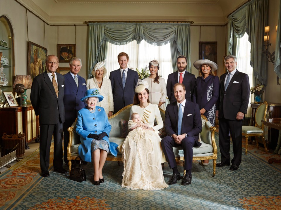  The Middletons pose for Prince George's official christening photo as they have been welcomed with open arms by the Royal Family