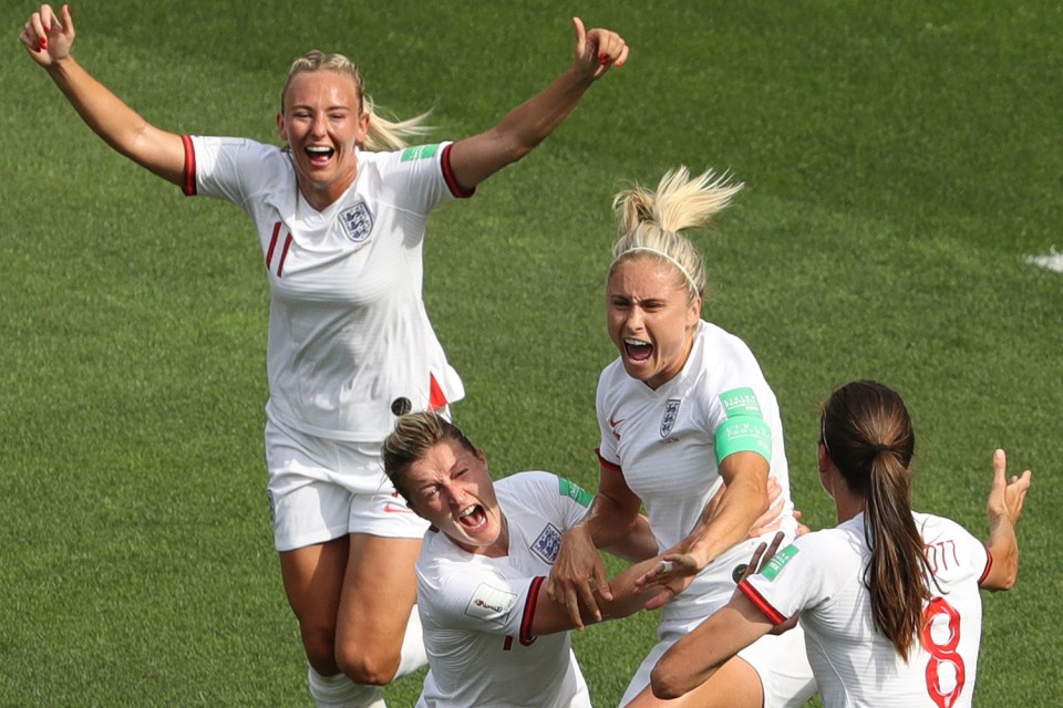  England captain Steph Houghton, second from right, could lead the national team out in front of a record crowd at Wembley