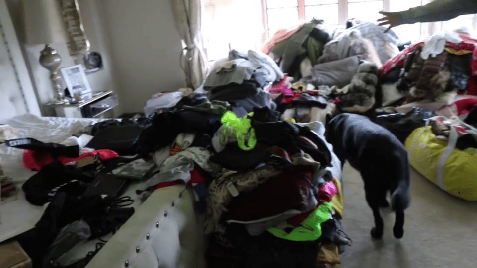  The star showed one bedroom piled high with old clothes