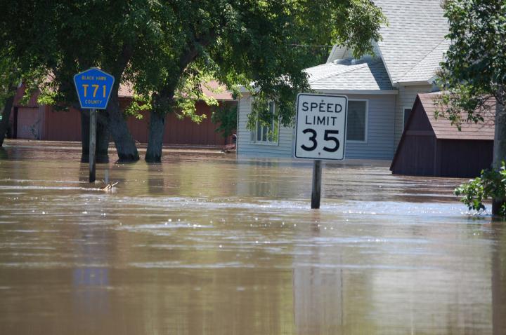  Flooding in Iowa. Floods will become much more common across the globe if climate change continues