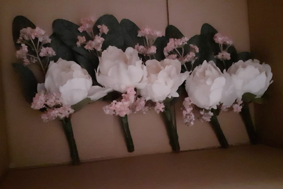  A bride has revealed how she made her own button holes for £2 using fake flowers from Ikea