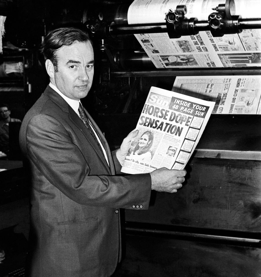  Rupert Murdoch holding the first tabloid of The Sun in November 1969