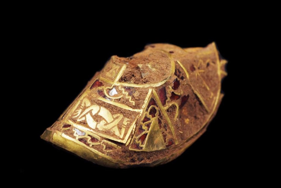 The collection, including this gold sword fitting with inlaid garnet, sold for over £3 million