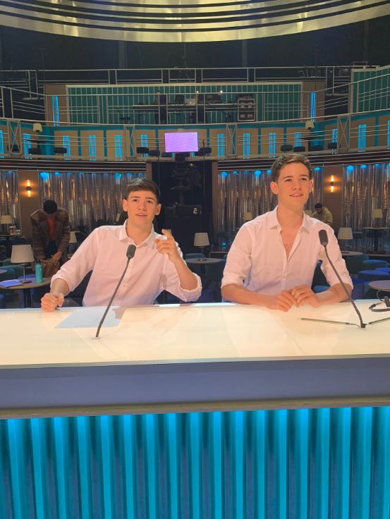  They struck a series of poses behind the judging desk