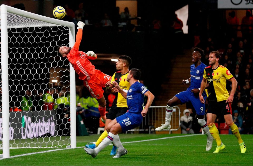  Watford's English goalkeeper Ben Foster produces a brilliant spiralling tip-away save to thwart Mason Mount