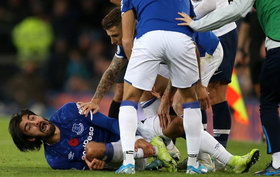  Everton star Andre Gomes was left with a broken and dislocated ankle after getting his foot caught in the turf