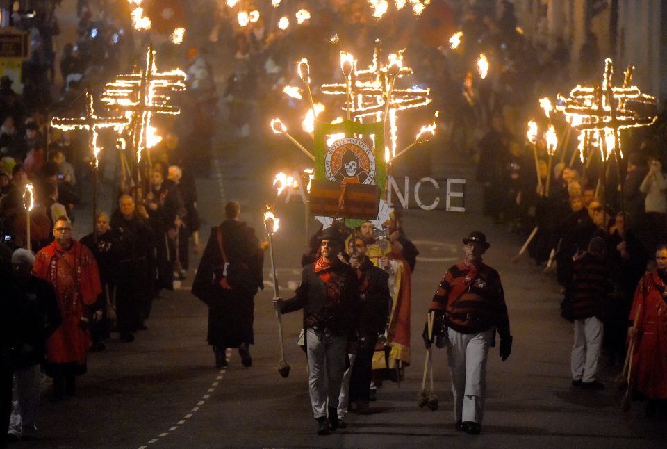  Bonfire societies parade through the streets during traditional Bonfire Night celebrations in Lewes