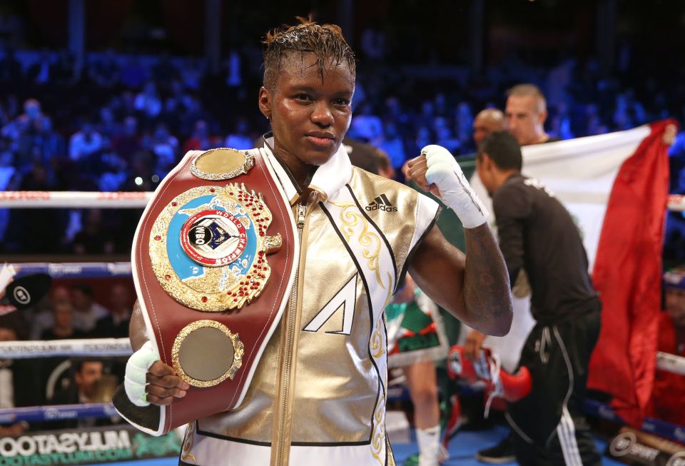  Adams poses with her WBO flyweight belt after her final fight