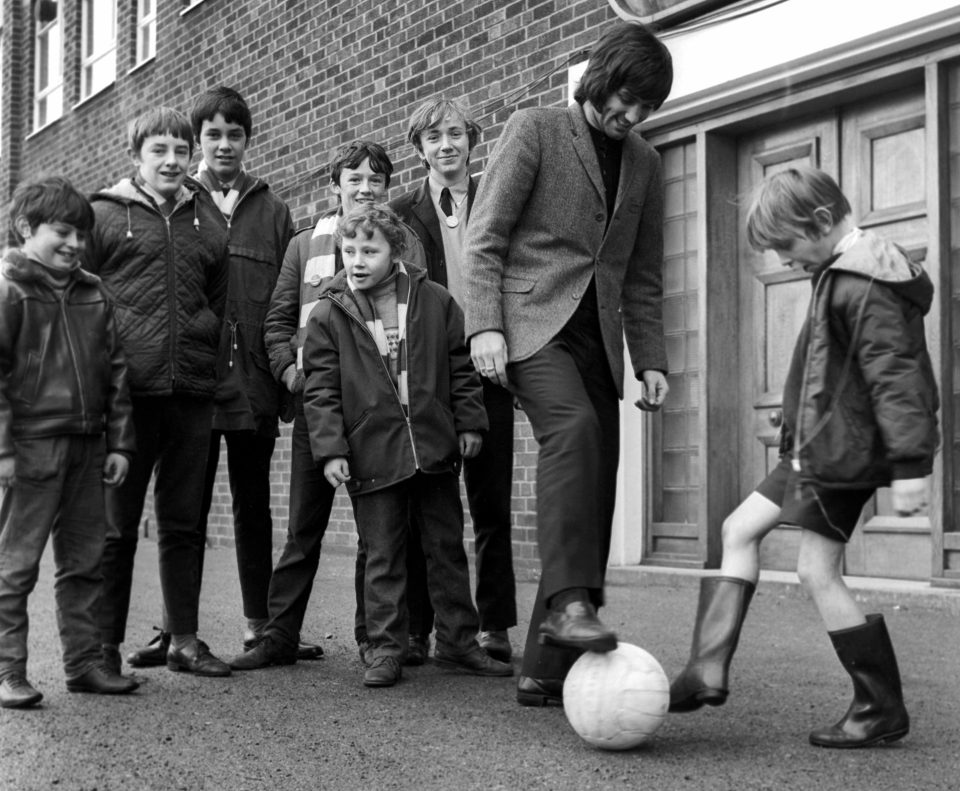  George Best has a kickabout with young fans outside Old Trafford in 1969