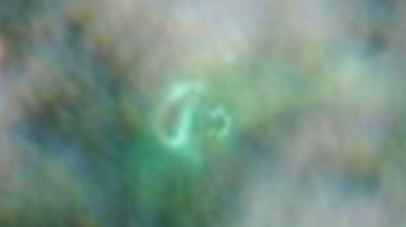  On this satellite image you can see the new island as the large green dot and the now sunken island as the small green dot