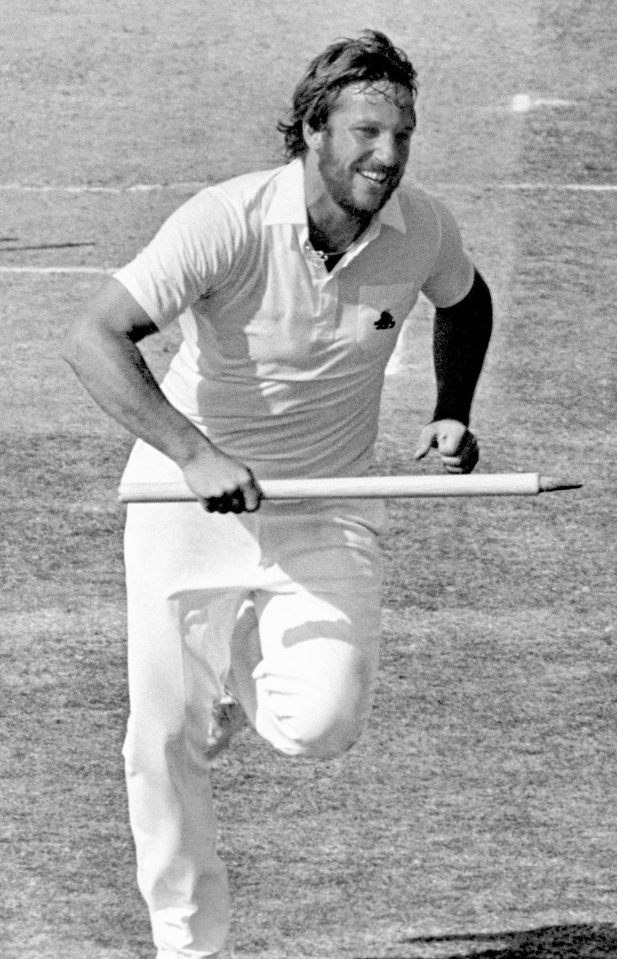  Ian Botham grabs a stump after England's famous Test win in 1981