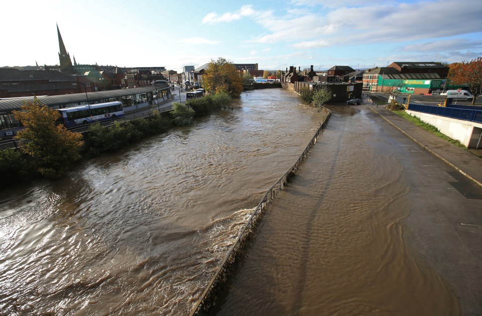  This aerial shot of the River Don shows how it broke its banks after torrential rain